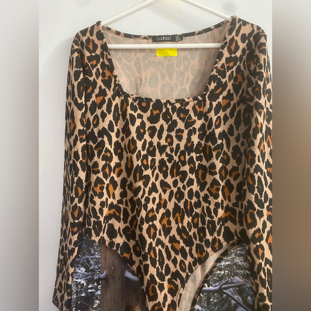 Leopard print bodysuit, size 12. Good condition- very lightly used